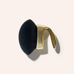 Blend and Blur Body Brush product on tan background