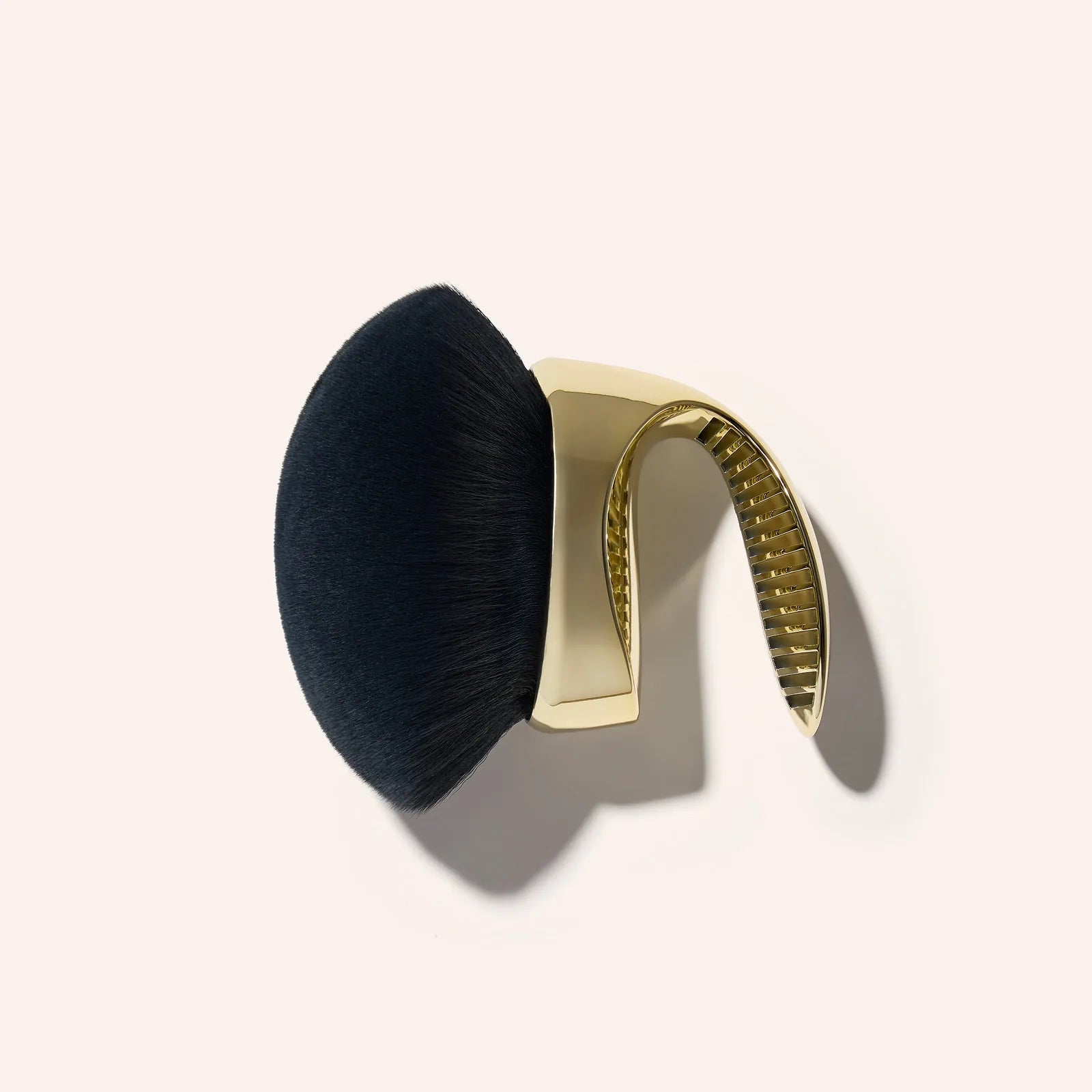 Blend and Blur Body Brush product on tan background